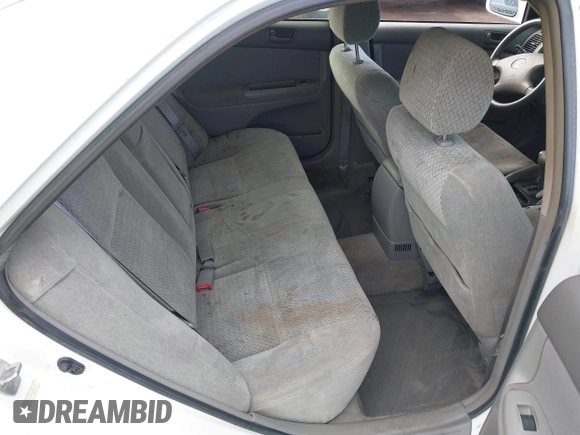 2002 Toyota Camry LE z VIN JTDBE32K120093737, wystawiony jako IAAI lot #41214245 z przebiegiem Nie podano mil oraz . Historia ofert i sprzedaży dostępna na DreamBid. Obrazek 8.