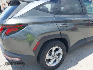 2022 Hyundai Tucson SE with VIN 5NMJA3AE3NH070046, listed as a IAAI auction lot 42197532 with 32,425 mi miles and . Bid and sale history available at carsss.com. Image 6.