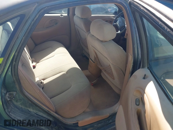 1996 Ford Taurus LX with VIN 1FALP53S0TG125665, listed as a IAAI auction lot 42290691 with 91,152 mi miles and . Bid and sale history available at DreamBid. Image 8.