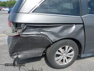 2015 Honda Odyssey EX z VIN 5FNRL5H41FB059667, wystawiony jako IAAI lot #42274039 z przebiegiem 196 687 mil mil oraz . Historia ofert i sprzedaży dostępna na DreamBid. Obrazek 6.