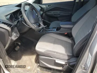2018 Ford Escape S with VIN 1FMCU0F78JUB79464, listed as a Copart auction lot 58812925 with 104,642 mi miles and Salvage title. Bid and sale history available at DreamBid. Image 7.
