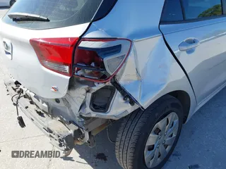 2020 Kia Rio S with VIN 3KPA25AD4LE309303, listed as a IAAI auction lot 41800912 with 75,393 mi miles and . Bid and sale history available at DreamBid. Image 6.