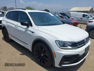 2021 Volkswagen Tiguan SE z VIN 3VV3B7AX8MM048796, wystawiony jako IAAI lot #42455275 z przebiegiem 77 348 mil mil oraz . Historia ofert i sprzedaży dostępna na DreamBid. Obrazek 1.