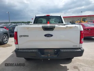2015 Ford F-150 XL with VIN 1FTMF1E84FKD12758, listed as a IAAI auction lot 41841584 with 59,950 mi miles and . Bid and sale history available at DreamBid. Image 8.