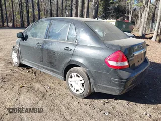 2010 Nissan Versa 1.8 S with VIN 3N1BC1APXAL429610, listed as a IAAI auction lot 41443072 with 152,088 mi miles. Bid and sale history available at carsss.com. Image 3.