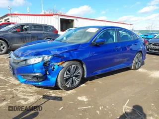2017 Honda Civic EX-T with VIN 19XFC1E33HE028257, listed as a IAAI auction lot 41395356 with 51,154 mi miles and . Bid and sale history available at DreamBid. Image 2.