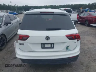 2018 Volkswagen Tiguan S with VIN 3VV1B7AX1JM032250, listed as a IAAI auction lot 42366790 with 65,406 mi miles and . Bid and sale history available at DreamBid. Image 16.