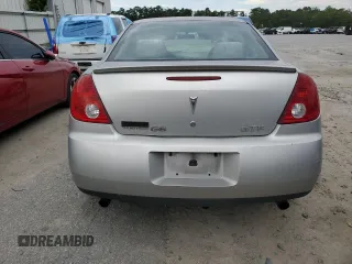 2006 Pontiac G6 GTP z VIN 1G2ZM551364162379, wystawiony jako Copart lot #73416394 z przebiegiem 218 222 mil mil oraz Szkoda całkowita • Salvage title. Historia ofert i sprzedaży dostępna na DreamBid. Obrazek 6.