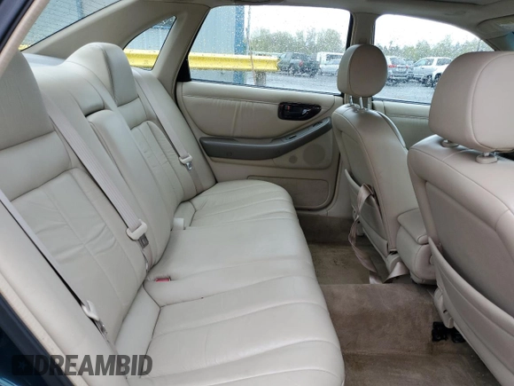 1998 Toyota Avalon XL with VIN 4T1BF18B6WU242906, listed as a Copart auction lot 52385935 with 108,802 mi miles and Salvage Title. Bid and sale history available at DreamBid. Image 11.