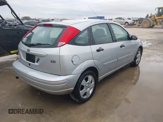 2004 Ford Focus with VIN 3FAFP37Z54R127432, listed as a IAAI auction lot 41586056 with 159,927 mi miles and . Bid and sale history available at DreamBid. Image 4.