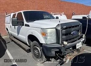 2015 Ford Super Duty F-250 SRW Lariat with VIN 1FT7W2B67FEB26717, listed as a IAAI auction lot 41995479 with 262,859 mi miles. Bid and sale history available at carsss.com. Image 1.