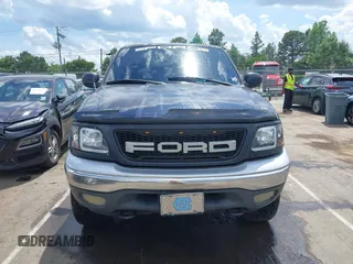2001 Ford F-150 XLT z VIN 1FTRW08LX1KD56482, wystawiony jako IAAI lot #42155153 z przebiegiem 340 009 mil mil oraz . Historia ofert i sprzedaży dostępna na DreamBid. Obrazek 12.
