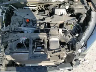 2019 Honda HR-V LX z VIN 3CZRU5H37KG713283, wystawiony jako Copart lot #84261665 z przebiegiem 87 923 mil mil oraz Szkoda całkowita • Salvage title. Historia ofert i sprzedaży dostępna na DreamBid. Obrazek 14.