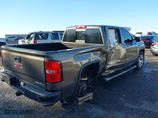 2015 GMC Sierra 1500 Denali with VIN 3GTU2WEC9FG355576, listed as a IAAI auction lot 41151606 with 115,017 mi miles. Bid and sale history available at carsss.com. Image 6.