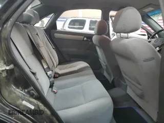 2008 Suzuki Forenza z VIN KL5JD56Z48K957359, wystawiony jako Copart lot #79184084 z przebiegiem 142 632 mil mil oraz Tytuł czysty. Historia ofert i sprzedaży dostępna na DreamBid. Obrazek 10.