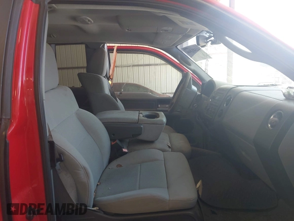 2007 Ford F-150 XLT z VIN 1FTPX04597KB14853, wystawiony jako IAAI lot #42581346 z przebiegiem 159 071 mil mil oraz . Historia ofert i sprzedaży dostępna na DreamBid. Obrazek 5.