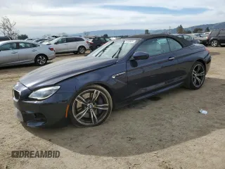 2016 BMW M6 z VIN WBS6G9C5XGD932039, wystawiony jako Copart lot #47433685 z przebiegiem 66 836 mil mil oraz Szkody całkowita. Historia ofert i sprzedaży dostępna na DreamBid. Obrazek 1.