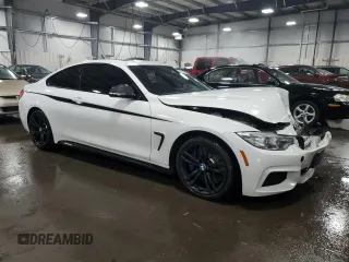 2014 BMW 4 Series 435i with VIN WBA3R1C52EK192076, listed as a Copart auction lot 60098595 with 89,504 mi miles and Salvage title. Bid and sale history available at DreamBid. Image 4.