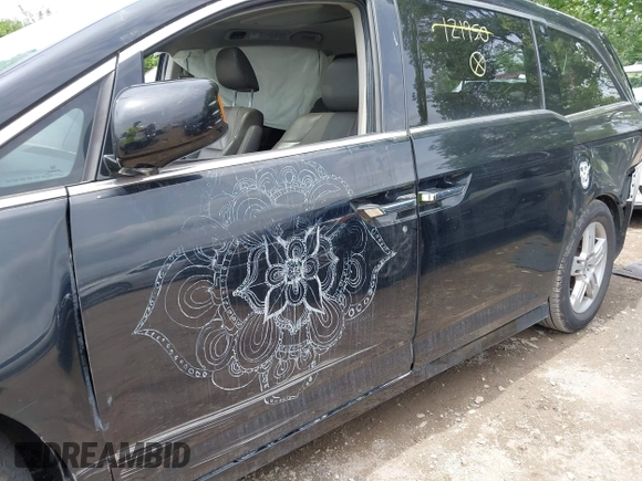 2012 Honda Odyssey Touring with VIN 5FNRL5H91CB121950, listed as a IAAI auction lot 42456620 with 200,831 mi miles and . Bid and sale history available at DreamBid. Image 14.