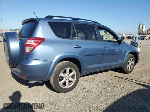 2010 Toyota RAV4 Limited with VIN JTMYK4DV1AD003591, listed as a Copart auction lot 61499555 with 100,940 mi miles and Salvage title. Bid and sale history available at DreamBid. Image 3.