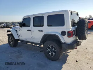 2018 Jeep Wrangler Unlimited Rubicon с VIN 1C4HJXFGXJW210780, выставлен на аукционе Copart как лот 50590655 с пробегом 98 416 миль миль и Списание • Salvage title. История ставок и продаж доступна на DreamBid. Изображение 2.