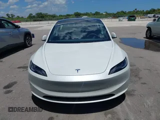 2024 Tesla Model 3 z VIN 5YJ3E1EA7RF721503, wystawiony jako IAAI lot #42246752 z przebiegiem 8 807 mil mil oraz . Historia ofert i sprzedaży dostępna na DreamBid. Obrazek 6.