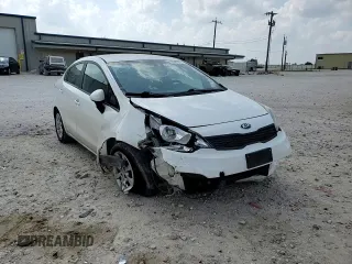 2017 Kia Rio LX z VIN KNADM4A36H6044693, wystawiony jako Copart lot #55349215 z przebiegiem 84 323 mil mil oraz Szkody całkowita. Historia ofert i sprzedaży dostępna na DreamBid. Obrazek 14.