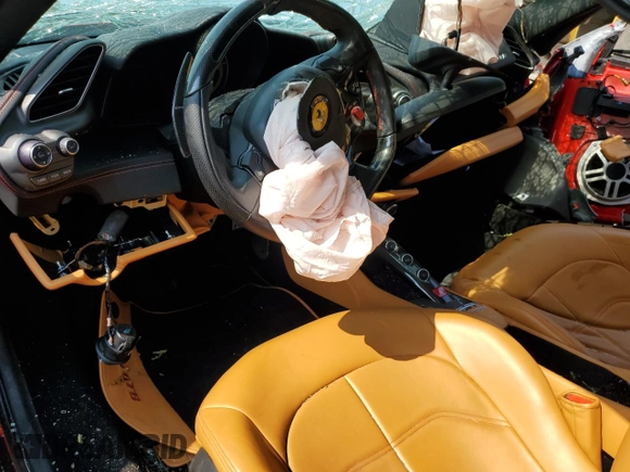 2018 Ferrari 488 z VIN ZFF79ALA0J0235841, wystawiony jako Copart lot #70033674 z przebiegiem Nie podano mil oraz Tytuł czysty. Historia ofert i sprzedaży dostępna na DreamBid. Obrazek 8.