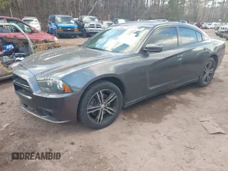2014 Dodge Charger SXT Plus with VIN 2C3CDXJG7EH138261, listed as a IAAI auction lot 41546437 with 224,129 mi miles. Bid and sale history available at carsss.com. Image 2.