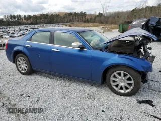 2009 Chrysler 300 LX with VIN 2C3KA43D29H581073, listed as a Copart auction lot 48702345 with 142,917 mi miles and Salvage Title. Bid and sale history available at carsss.com. Image 4.