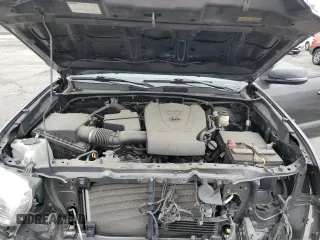 2018 Toyota Tacoma SR5 z VIN 3TMAZ5CN1JM073441, wystawiony jako Copart lot #59153555 z przebiegiem 31 383 mil mil oraz Szkoda całkowita • Salvage title. Historia ofert i sprzedaży dostępna na DreamBid. Obrazek 11.