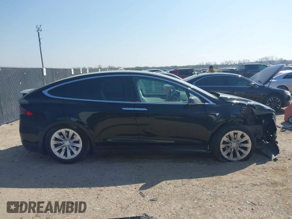 2019 Tesla Model X 75D with VIN 5YJXCBE22KF184504, listed as a IAAI auction lot 41802023 with 137,094 mi miles. Bid and sale history available at carsss.com. Image 13.