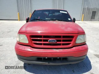 2002 Ford F-150 XL z VIN 1FTRF07202KB68581, wystawiony jako Copart lot #60276095 z przebiegiem 164 754 mil mil oraz Szkoda całkowita • Salvage title. Historia ofert i sprzedaży dostępna na DreamBid. Obrazek 5.