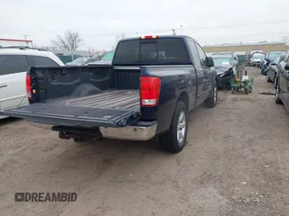 2008 Nissan Titan SE with VIN 1N6AA06A38N352356, listed as a IAAI auction lot 41000718 with 157,029 mi miles. Bid and sale history available at carsss.com. Image 4.