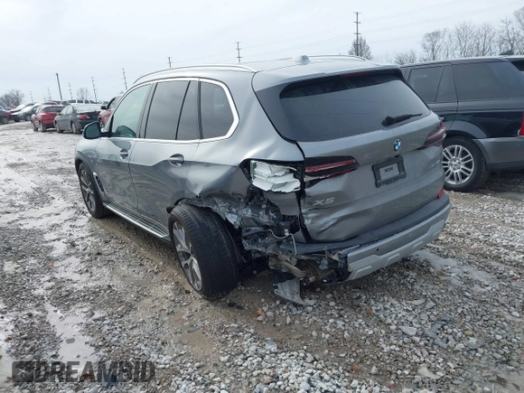2025 BMW X5 xDrive40i with VIN 5UX23EU02S9X44610, listed as a IAAI auction lot 41469794 with 1,964 mi miles. Bid and sale history available at carsss.com. Image 3.
