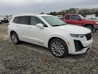 2022 Cadillac XT6 Premium Luxury with VIN 1GYKPCRS8NZ119020, listed as a Copart auction lot 80645524 with 29,173 mi miles and Salvage Title. Bid and sale history available at carsss.com. Image 4.