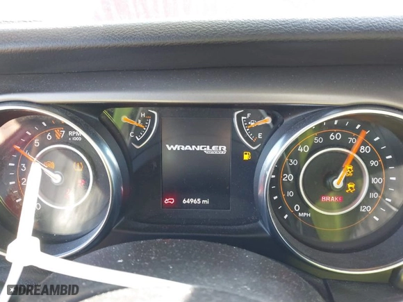 2019 Jeep Wrangler Unlimited Sport with VIN 1C4HJXDG0KW519050, listed as a IAAI auction lot 41621866 with 64,965 mi miles. Bid and sale history available at carsss.com. Image 7.