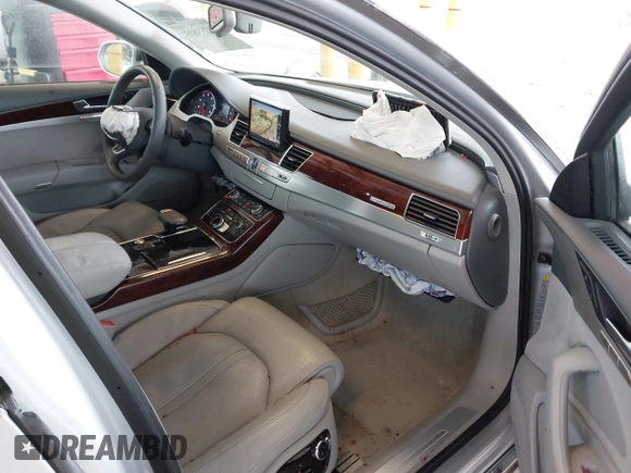 2013 Audi A8 4.0L с VIN WAUA2AFD5DN017770, выставлен на аукционе IAAI как лот 41255625 с пробегом 115 993 миль миль и . История ставок и продаж доступна на DreamBid. Изображение 5.