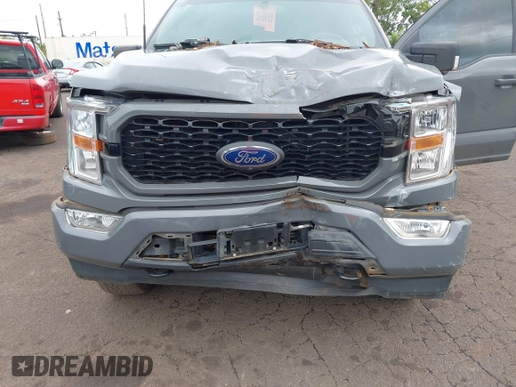 2021 Ford F-150 XL with VIN 1FTEW1EP0MFB94936, listed as a IAAI auction lot 41594393 with 57,033 mi miles. Bid and sale history available at carsss.com. Image 6.