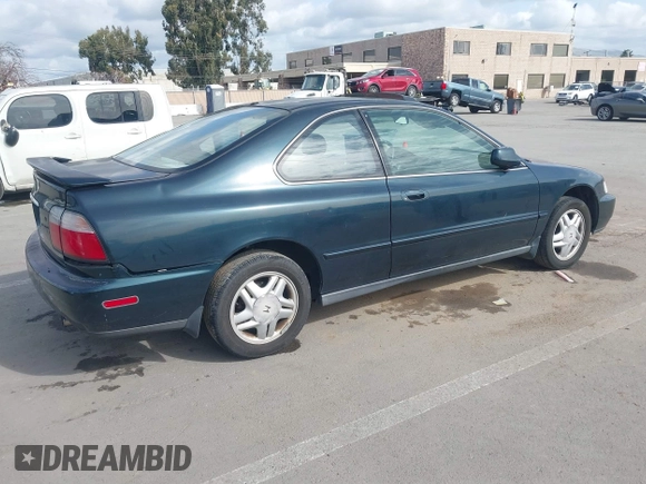 1997 Honda Accord EX with VIN 1HGCD7158VA014025, listed as a IAAI auction lot 41582343 with 302,660 mi miles and . Bid and sale history available at carsss.com. Image 4.