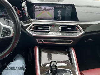 2021 BMW X6 sDrive40i z VIN 5UXCY4C05M9H19479, wystawiony jako Copart lot #54268205 z przebiegiem 85 899 mil mil oraz Czysty tytuł • Clean title. Historia ofert i sprzedaży dostępna na DreamBid. Obrazek 9.