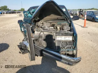 1996 Chevrolet Silverado 1500 with VIN 1GCEC14M6TZ154941, listed as a Copart auction lot 66361154 with 124,631 mi miles and Salvage Title. Bid and sale history available at DreamBid. Image 5.