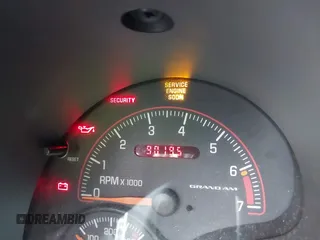 2003 Pontiac Grand Am SE with VIN 1G2NE52F03C323218, listed as a IAAI auction lot 41899309 with 90,195 mi miles. Bid and sale history available at carsss.com. Image 15.