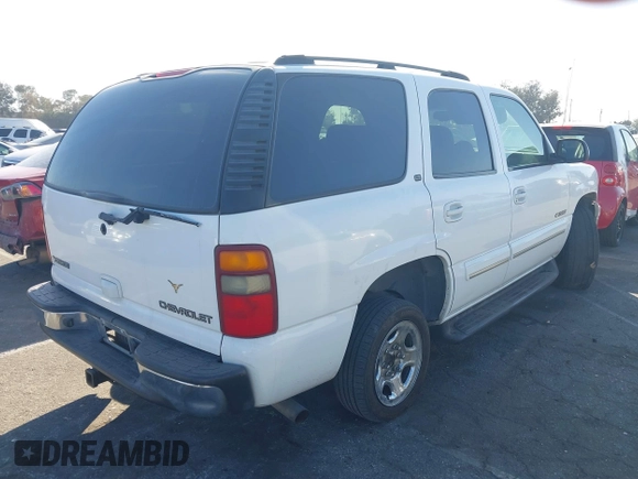 2003 Chevrolet Tahoe LT with VIN 1GNEC13Z73R168819, listed as a IAAI auction lot 41679179 with 141,164 mi miles and . Bid and sale history available at DreamBid. Image 4.