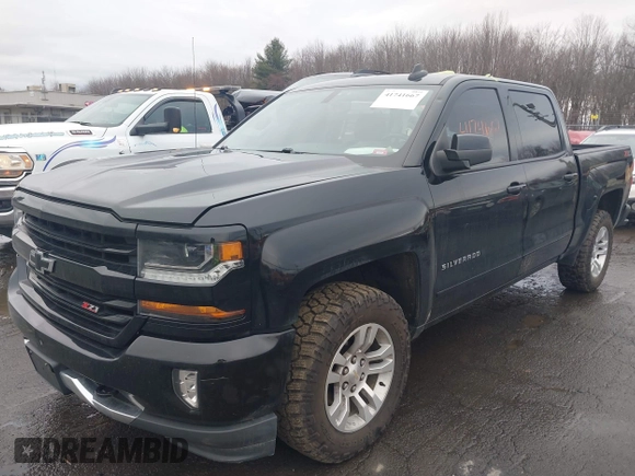 2018 Chevrolet Silverado 1500 LT with VIN 3GCUKREC5JG460979, listed as a IAAI auction lot 41741667 with 122,931 mi miles. Bid and sale history available at carsss.com. Image 2.