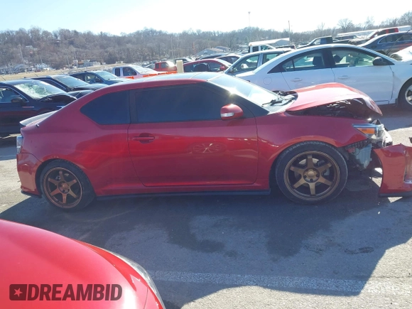 2016 Scion tC with VIN JTKJF5C77GJ026150, listed as a IAAI auction lot 41424088 with 96,370 mi miles. Bid and sale history available at carsss.com. Image 13.