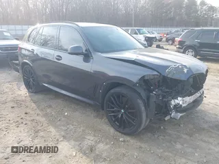 2020 BMW X5 sDrive40i with VIN 5UXCR4C06LLW64438, listed as a IAAI auction lot 41520407 with 89,868 mi miles and . Bid and sale history available at DreamBid. Image 1.