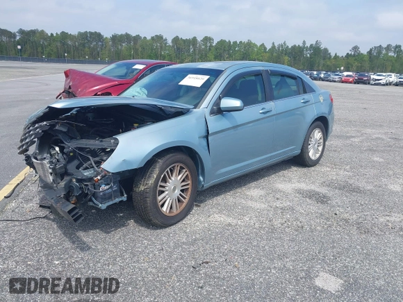 2009 Chrysler Sebring Touring z VIN 1C3LC56B89N517786, wystawiony jako IAAI lot #36918020 z przebiegiem 125 567 mil mil oraz . Historia ofert i sprzedaży dostępna na DreamBid. Obrazek 16.