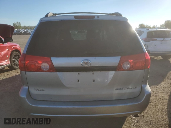 2010 Toyota Sienna with VIN 5TDZK4CCXAS335182, listed as a Copart auction lot 73518054 with 180,248 mi miles and Clean Title. Bid and sale history available at DreamBid. Image 6.