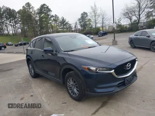 2017 Mazda CX-5 Touring with VIN JM3KFBCL9H0163449, listed as a IAAI auction lot 41919020 with 102,898 mi miles. Bid and sale history available at carsss.com. Image 1.